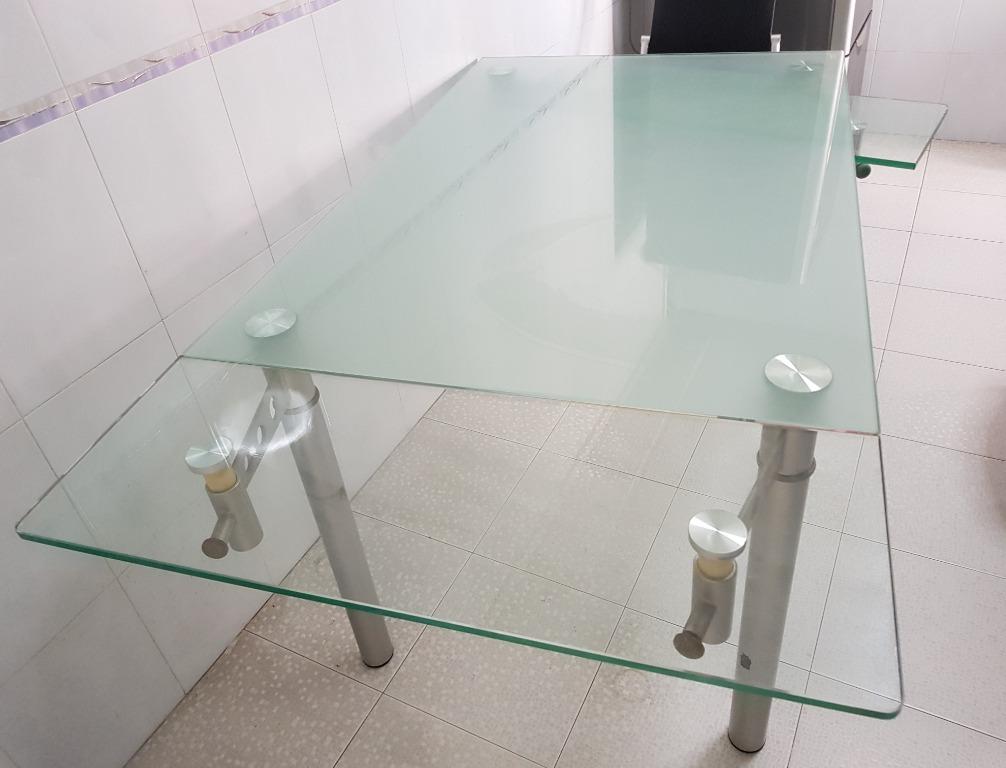Extendable Dining Table set (Category: Tables & Sets) located in Singapore. Submitted by ice_cw (Listing ID 1007643377, Image 2). Description: Extendable Thick Tempered glass dinig table set with 6 chairs. Thick Tempered Glass - 12mm. Versatile length for different occasion, cater for different group size. Height 75.2cm x Width 80.8cm x Length 122.1cm (Extendable each side x 29.2cm) Self collect at cck 680511 or arrange ur own delivery :).
