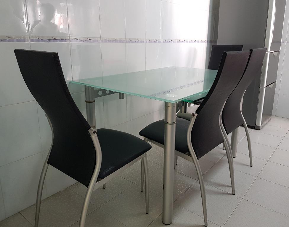 Extendable Dining Table set (Category: Tables & Sets) located in Singapore. Submitted by ice_cw (Listing ID 1007643377, Image 1). Description: Extendable Thick Tempered glass dinig table set with 6 chairs. Thick Tempered Glass - 12mm. Versatile length for different occasion, cater for different group size. Height 75.2cm x Width 80.8cm x Length 122.1cm (Extendable each side x 29.2cm) Self collect at cck 680511 or arrange ur own delivery :).