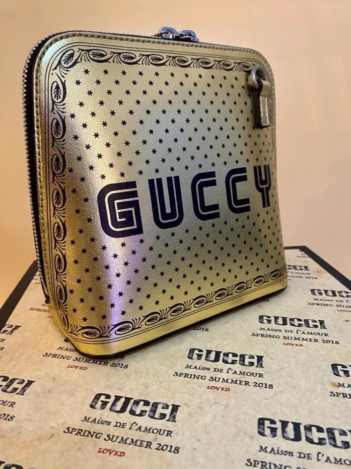Gucci - ????FIRE SALE???? - Exclusive - Two-Tone / Logo & Stars ‘GUCCY’ Gold Leather Sling Bag, Luxury ...