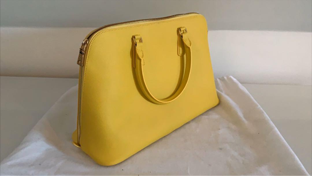 Prada Matinee Medium Handbag (Category: Women's Bags & Wallets) located in Sydney. Submitted by ashlleymaae (Listing ID 1007626516, Image 2). Description: L 38cm x W 14cm x H 26cm Dust bag included, slight marker marking on dustbag as shown in photo. Highly popular Prada Maintee Seasonal Colour Immaculate new condition; High quality graded replica. $250 includes postage..