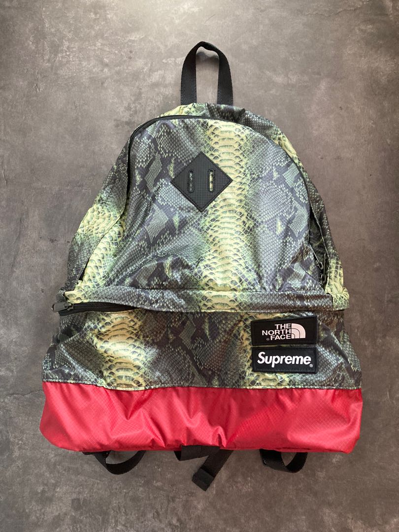 Supreme North Face green snakeskin backpack Women s Fashion Bags Wallets Cross body Bags on Carousell