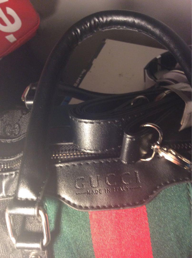 real gucci duffle bag