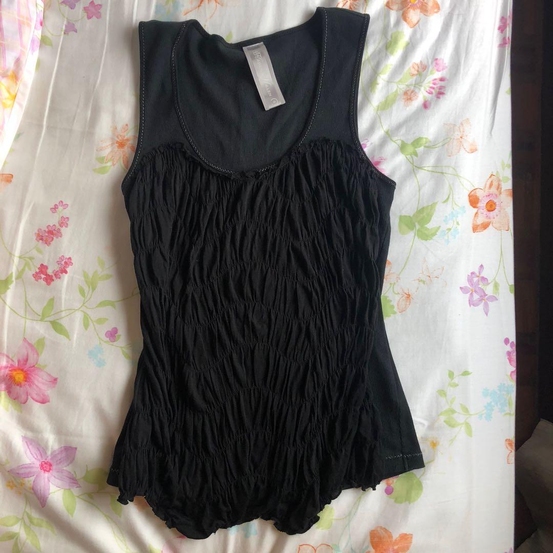 black ruffle sleeveless top