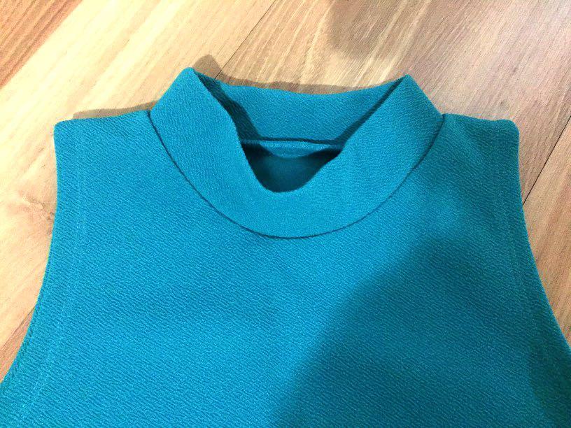 teal coloured tops