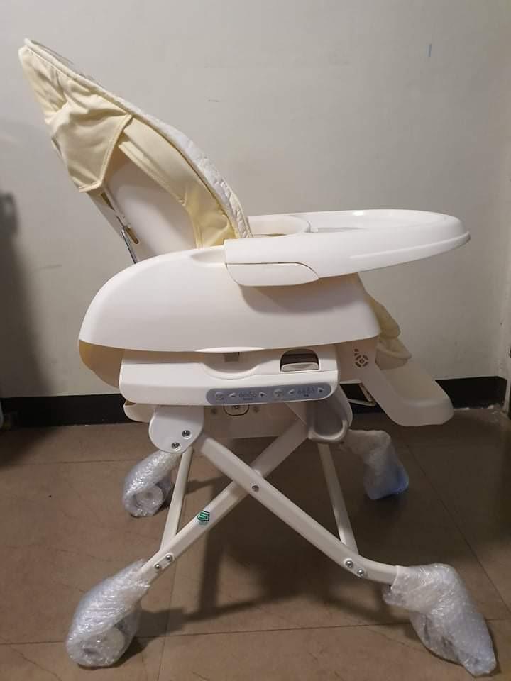 combi auto swing high chair