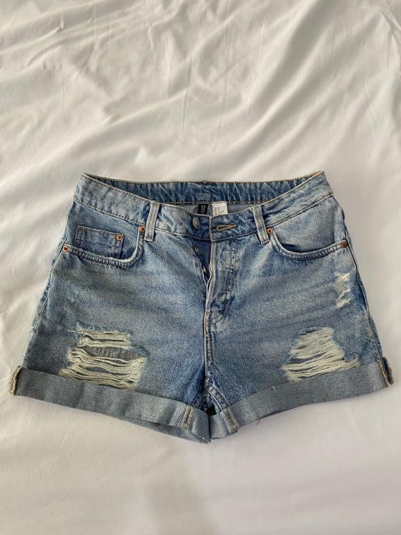 H&M Ripped HW Denim Shorts (Category: Shorts) located in Cainta. Submitted by red_umbrella (Listing ID 1008236033, Image 1). Description: Fits sizes S-M Used Non-stretch denim fabric Specific Measurements: L-12" W-27"-28" #carouswitch.