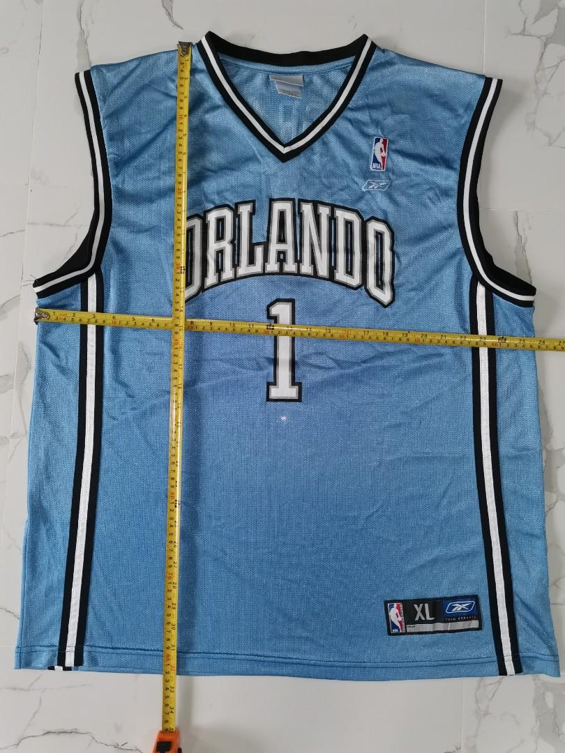 Vintage Tmac Reebok jersey (Category: Activewear) located in Calapan. Submitted by lucasthrifts (Listing ID 1008168954, Image 3). Description: Selling this Orlando Magic Tmac jersey.. XL size VG condition.. 1200 free shipping fee..