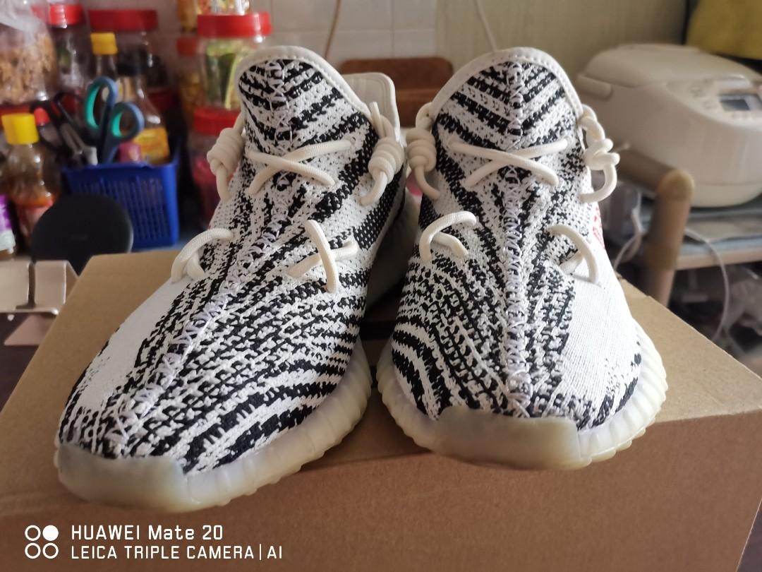 Yeezy zebra discount kaws