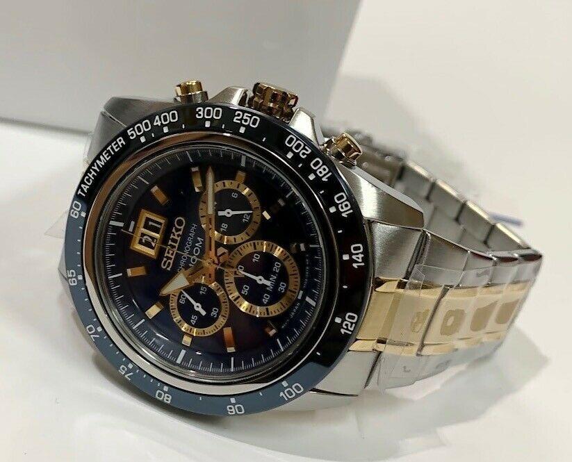 Seiko Lord Chronograph Tachymeter Blue and Gold Dial Silver