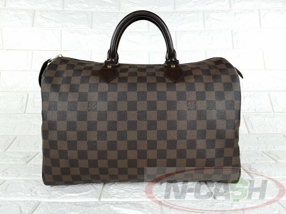 Pawn iaa shop louis vuitton