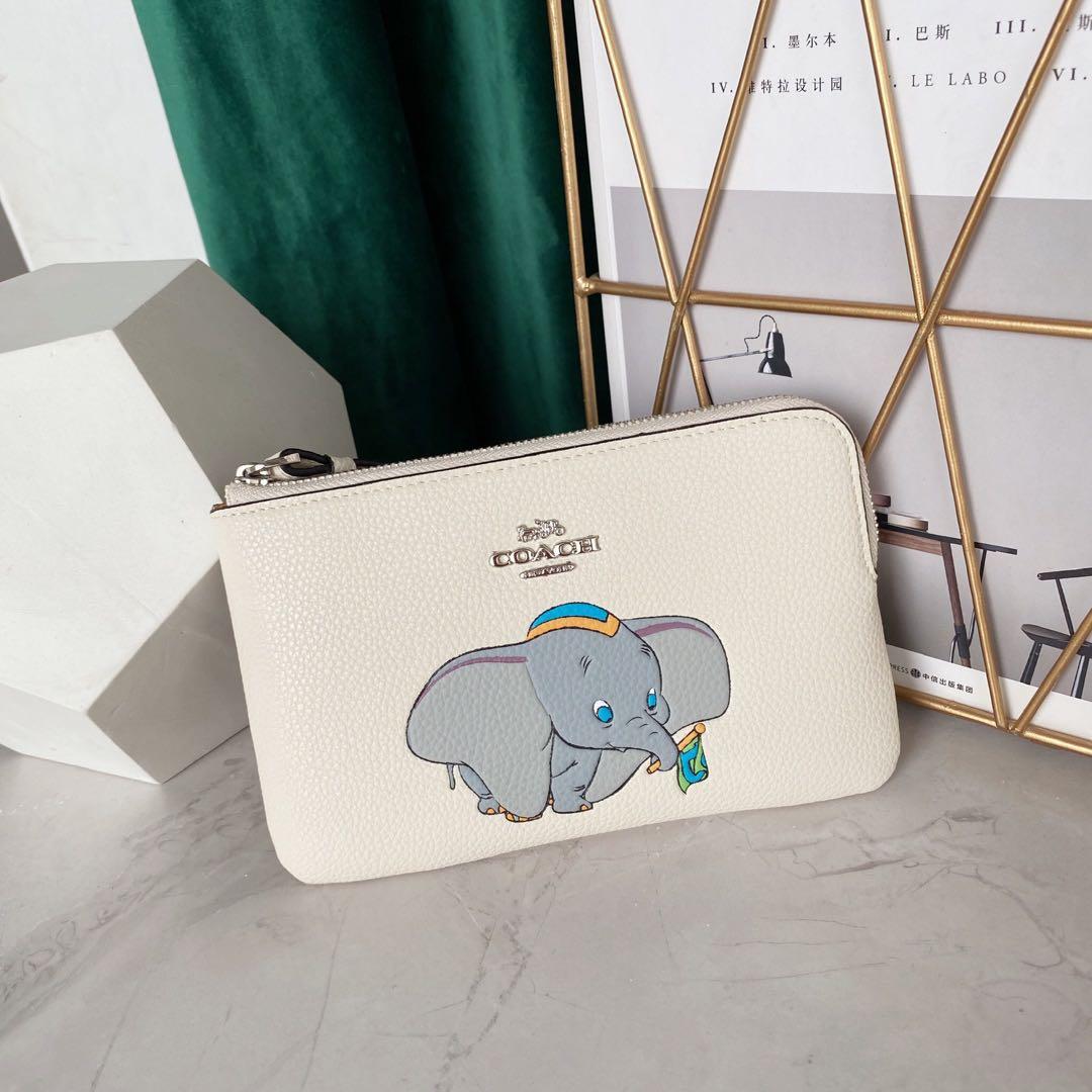Dumbo coach wristlet clearance