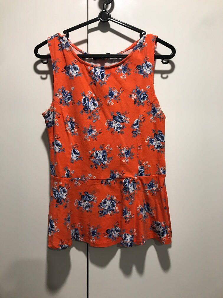 orange peplum top