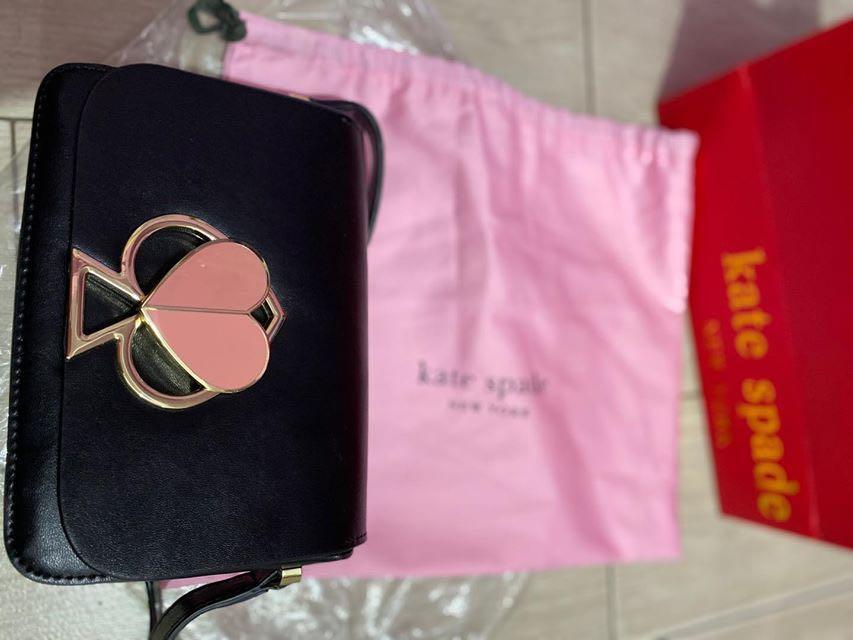 Kate Spade handbag (Category: Luxury Bags & Wallets) located in San Juan City. Submitted by carbie.things (Listing ID 1009066074, Image 1). Description: Black and pink heart locked handbag original kate spade dust and paper bag Rarely used Fits an iphone11 Message me for other photos and info #carouswitch Location: Pedro Gil.