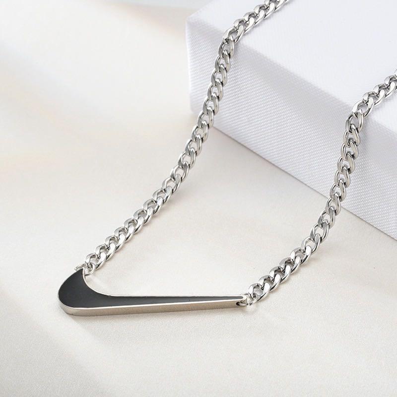 Silver nike necklace cheap