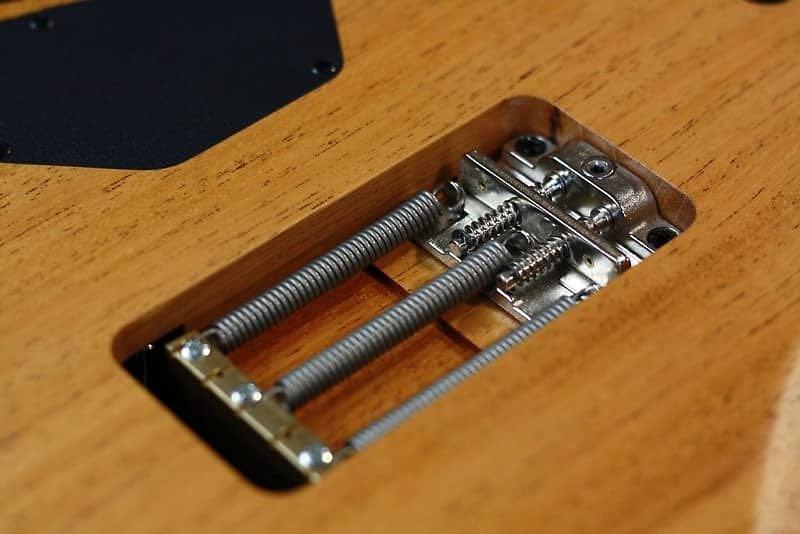 Tremolo claw outlet