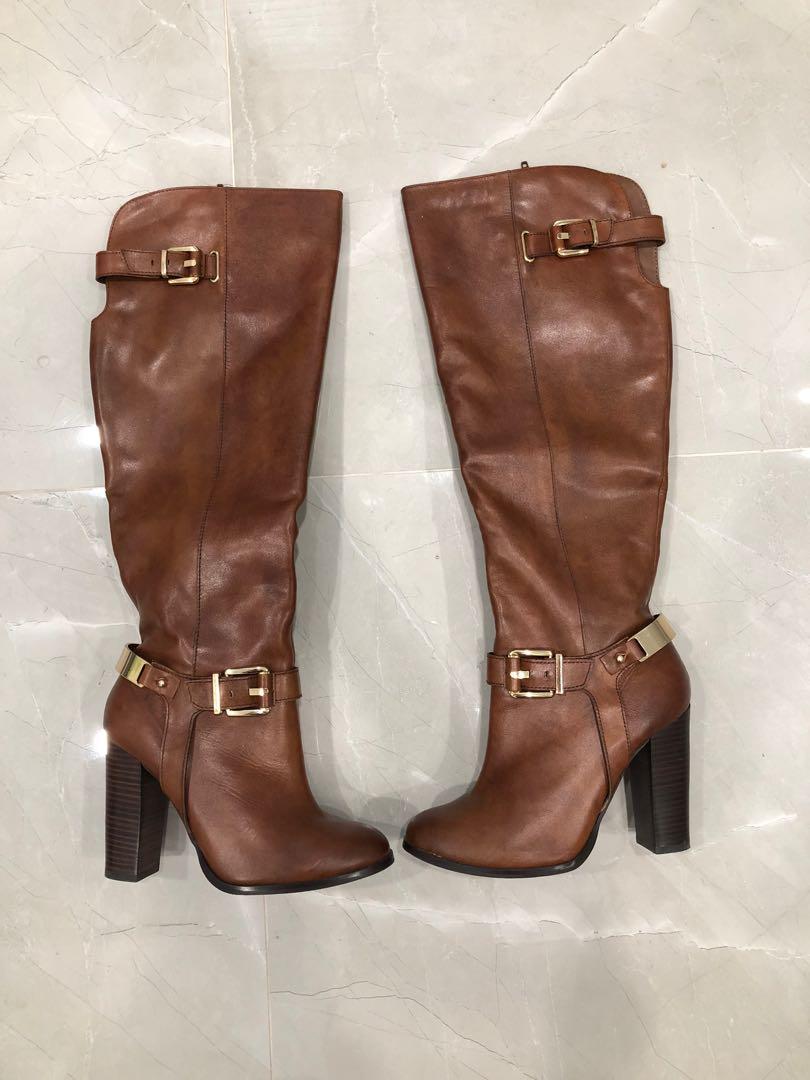 Aldo Brown Knee High Boots with Gold Buckle Detailing (Category: Shoes) located in Toronto. Submitted by samanthaf94 (Listing ID 1009279992, Image 1). Description: Worn once. Been in the box since. Price is negotiable. .