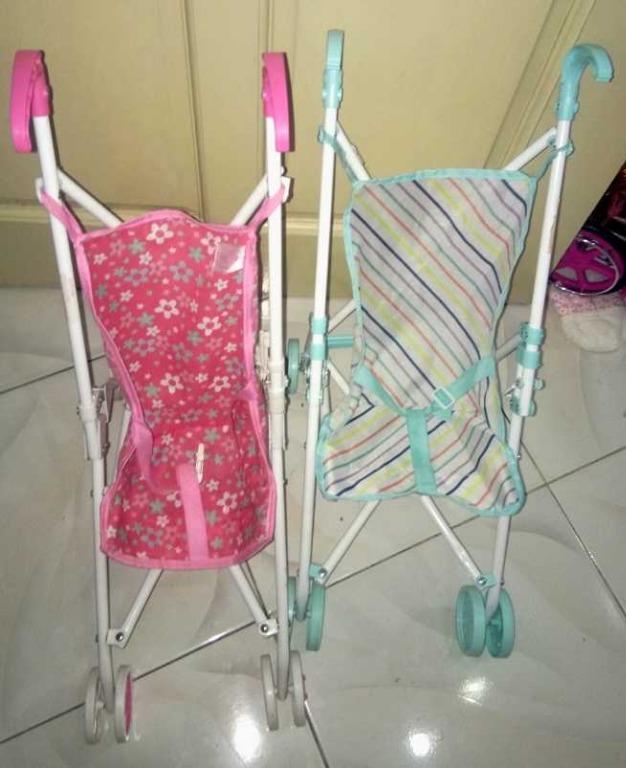 Doll stroller (Category: Strollers) located in Quezon City. Submitted by apple.ordinario (Listing ID 1009084953, Image 1). Description: 450 each.