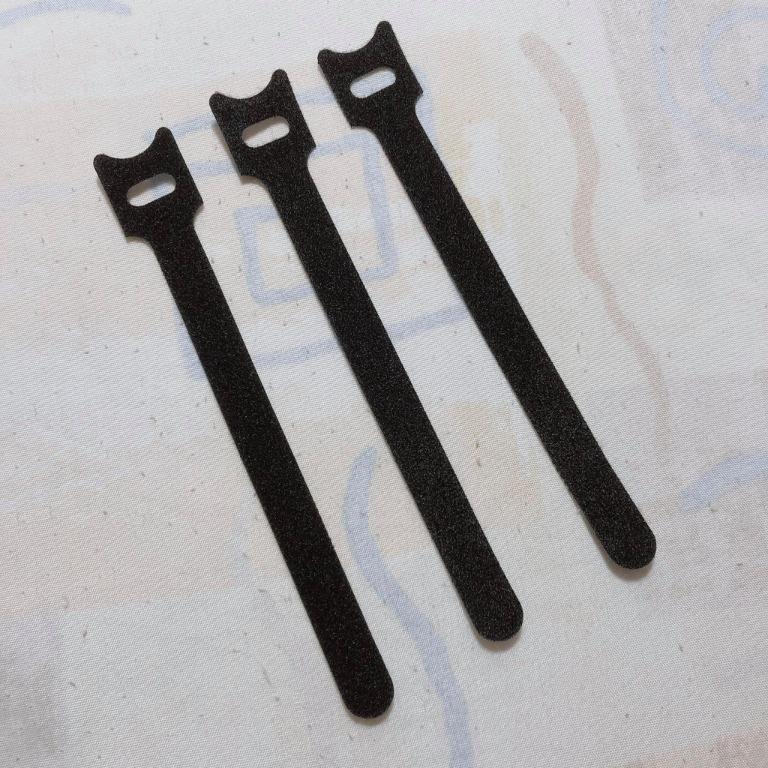 Nylon Velcro Cable Tie (Category: Cables & Adaptors) located in Manila. Submitted by ecolutionph (Listing ID 1009215790, Image 2). Description: Brand: Unknown Condition: New, Never been used - To be used for organizing cables & wires - Sold by: 3 cable ties Reason for Selling: Extra/ Decluttering Actual Item/ Photo.