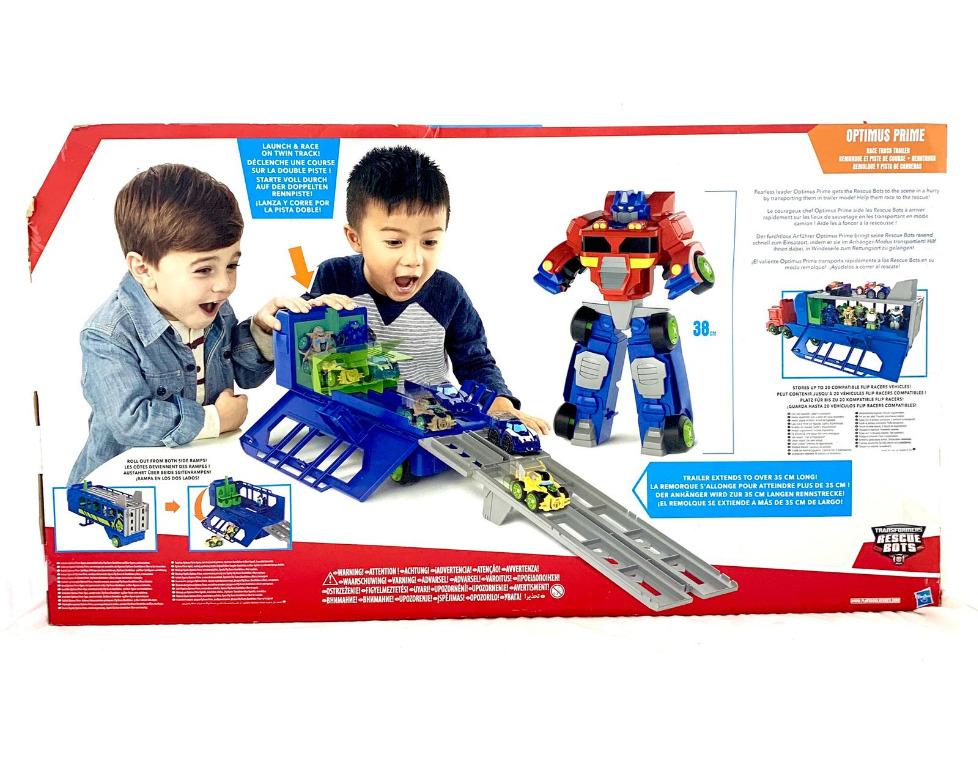 transformers rescue bots flip racers race track trailer playset