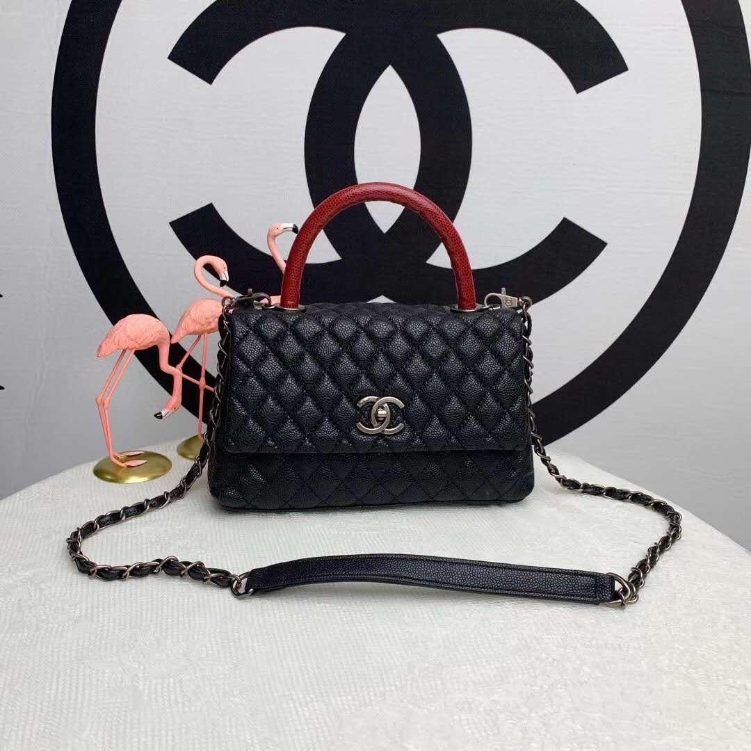 Chanel red handle