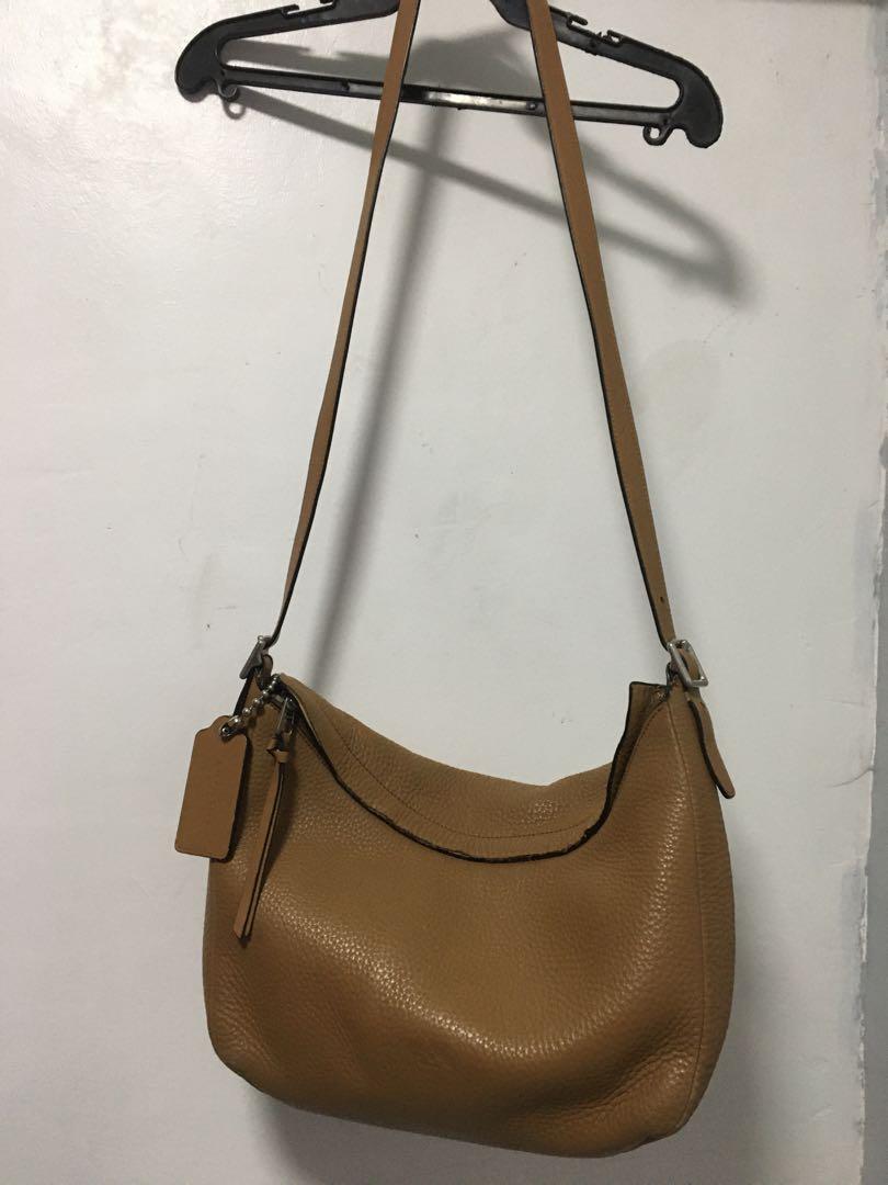 Coach Brown Sling Bag (Category: Cross-body Bags) located in San Juan City. Submitted by rvsouk (Listing ID 1009682531, Image 1). Description: Good condition. With signs of usage. Please see pics for your reference. Thank you. Php 1300 plus SF .