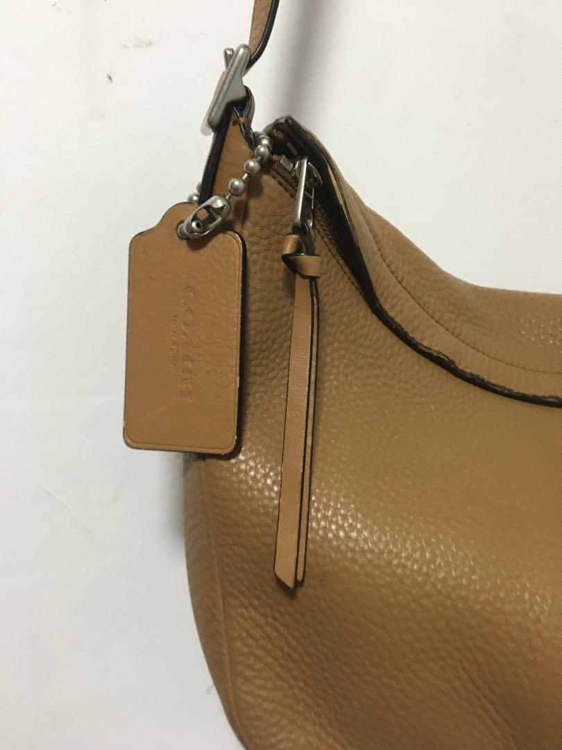 Coach Brown Sling Bag (Category: Cross-body Bags) located in San Juan City. Submitted by rvsouk (Listing ID 1009682531, Image 2). Description: Good condition. With signs of usage. Please see pics for your reference. Thank you. Php 1300 plus SF .
