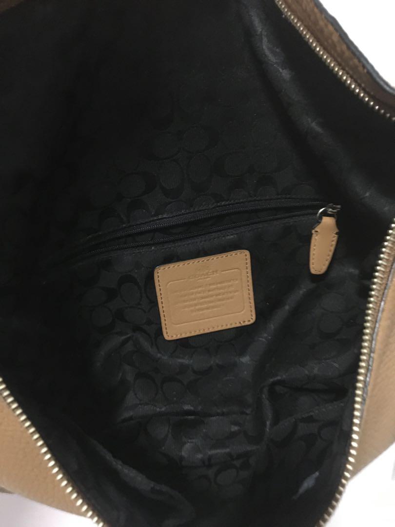 Coach Brown Sling Bag (Category: Cross-body Bags) located in San Juan City. Submitted by rvsouk (Listing ID 1009682531, Image 3). Description: Good condition. With signs of usage. Please see pics for your reference. Thank you. Php 1300 plus SF .