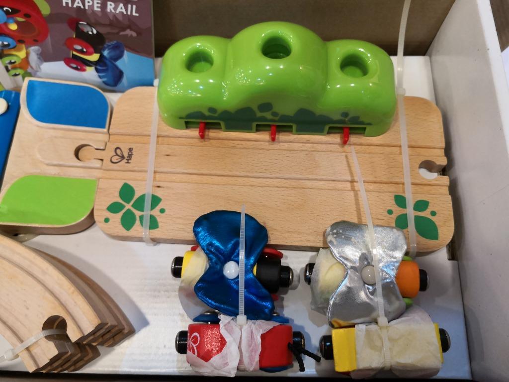 Hape monkey pop up track top