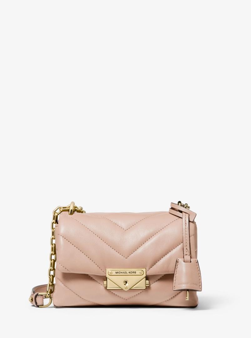 michael kors pink bag with gold studs