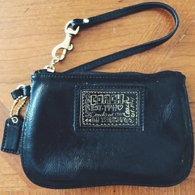 Authentic Coach Poppy Black Gold Wristlet