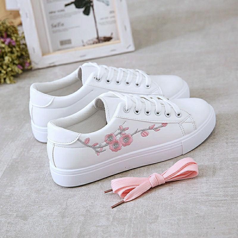 White sneakers hotsell with embroidery