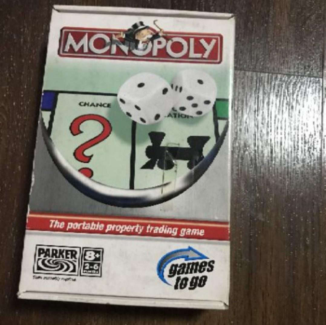 Monopoly : The Portable Property Trading Game (Category: Board Games & Puzzles) located in Quezon City. Submitted by sulitproductss (Listing ID 1004047972, Image 2). Description: A very small travel version of Monopoly which often comes in the shape of a red suitcase and plays very similarly to the original game. One difference is that it contains three dice. The Community Chest and Chance cards are replaced with tables. Three dice are rolled and