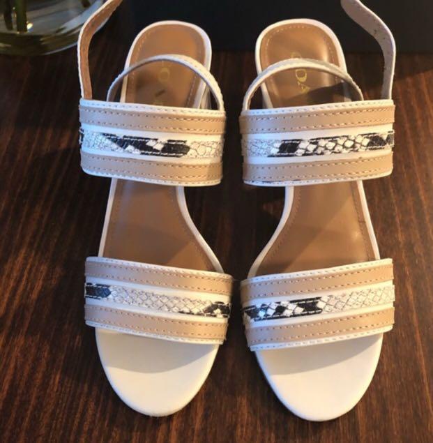 Original Coach white tan block heels (Category: Heels) located in Makati City. Submitted by shoppaholic_mom_of_beabee (Listing ID 1004056133, Image 2). Description: Leather stripes put a fun, graphic twist on a chunky block heel. A custom buckle and a tiny Coach hangtag add a flash of shine at the ankle. • Semi-matte calf leather • 3" heel • Style No. A01763 • Imported With flaws due to storage. Kaya selling for a very low price na #noguilt50.