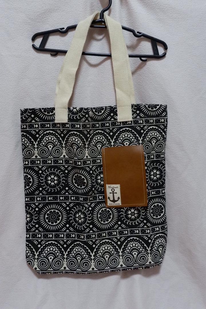 Handmade Tote Bag (Category: Tote Bags) located in Santa Rosa. Submitted by mainert (Listing ID 1010233274, Image 1). Description: Handmade Tote Bag bought in Thailand. Button locked. Color: Black Used once. Pm/chat for more info..