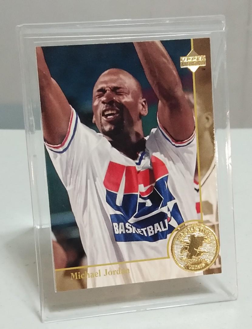 Michael Jordan USA gold medal card (Category: Vintage Collectibles) located in San Juan City. Submitted by zashichua (Listing ID 1010080187, Image 1). Description: upper deck Michael Jordan USA dream team gold medal card. mint condition. glass protective case not included, protective sleeve only.