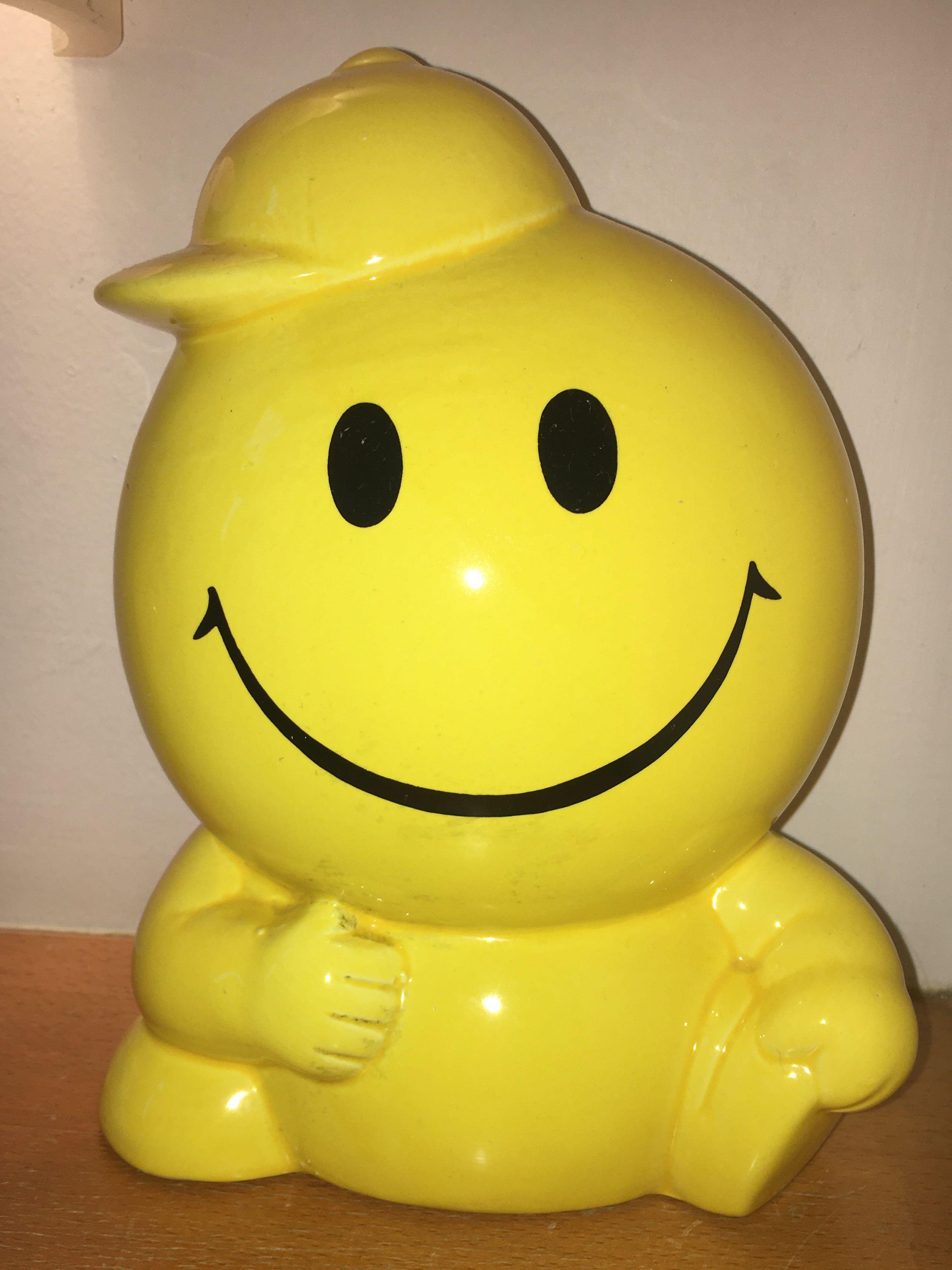 Smiley face piggy coin bank, Hobbies & Toys, Toys & Games on Carousell