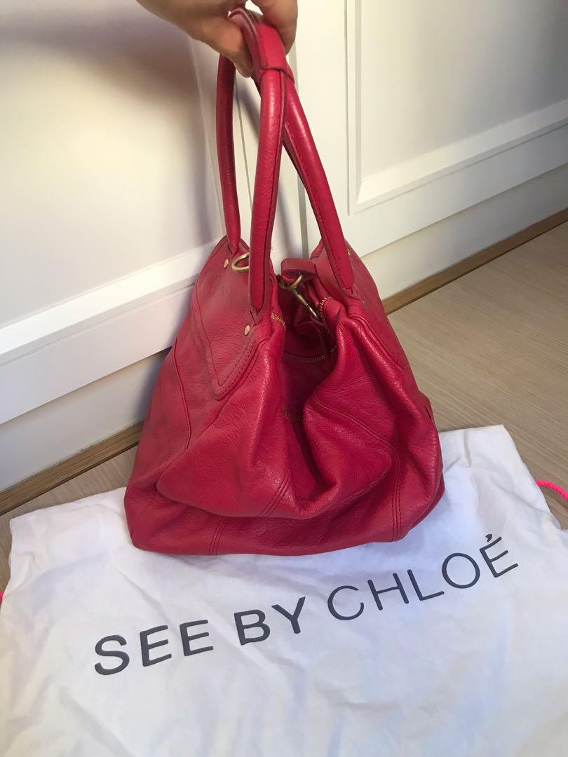 fuchsia leather handbag