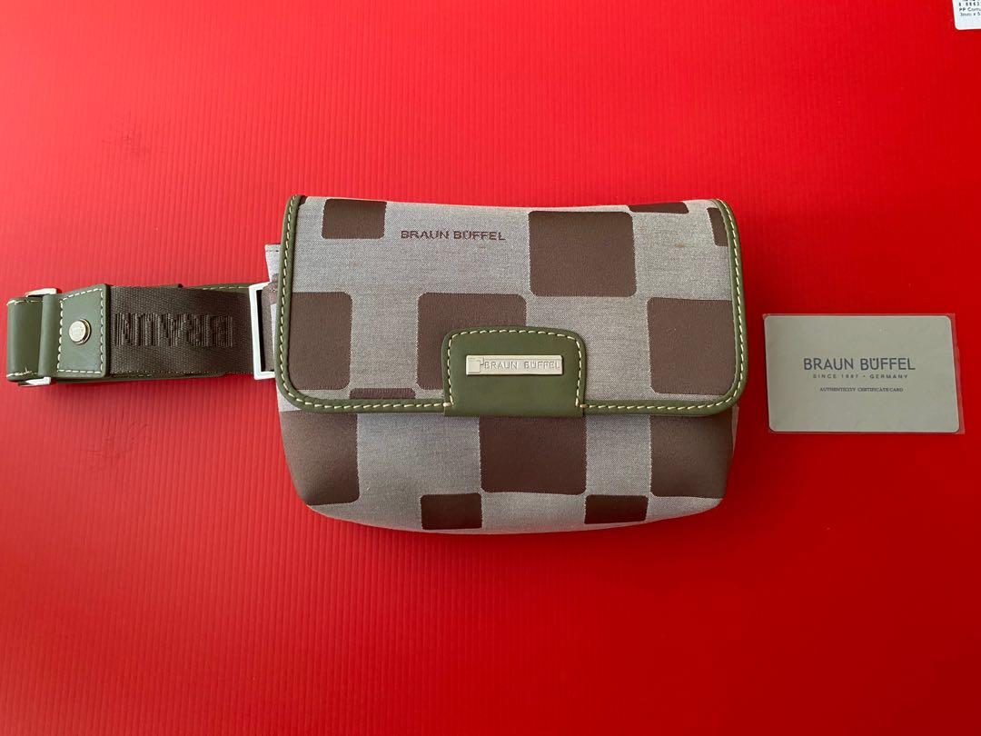 Branded Waist Pouch (Category: Bags & Wallets) located in Singapore. Submitted by purpose (Listing ID 1004550073, Image 2). Description: 100% Authentic Never used before at all. It comes with the tag still attached to it. Been kept a long time hence, it might have a couple of minor stain dots. BUT it’s not obvious. .