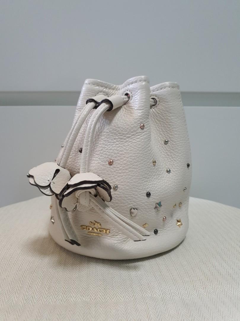 Coach mini bucket (Category: Tote Bags) located in Singapore. Submitted by joan3300 (Listing ID 1004458708, Image 1). Description: 1. 💯 Authentic Coach mini bucket bought in the boutique. 2. Excellent condition without any scratches & abrasion. 3. Slight nego 💲.