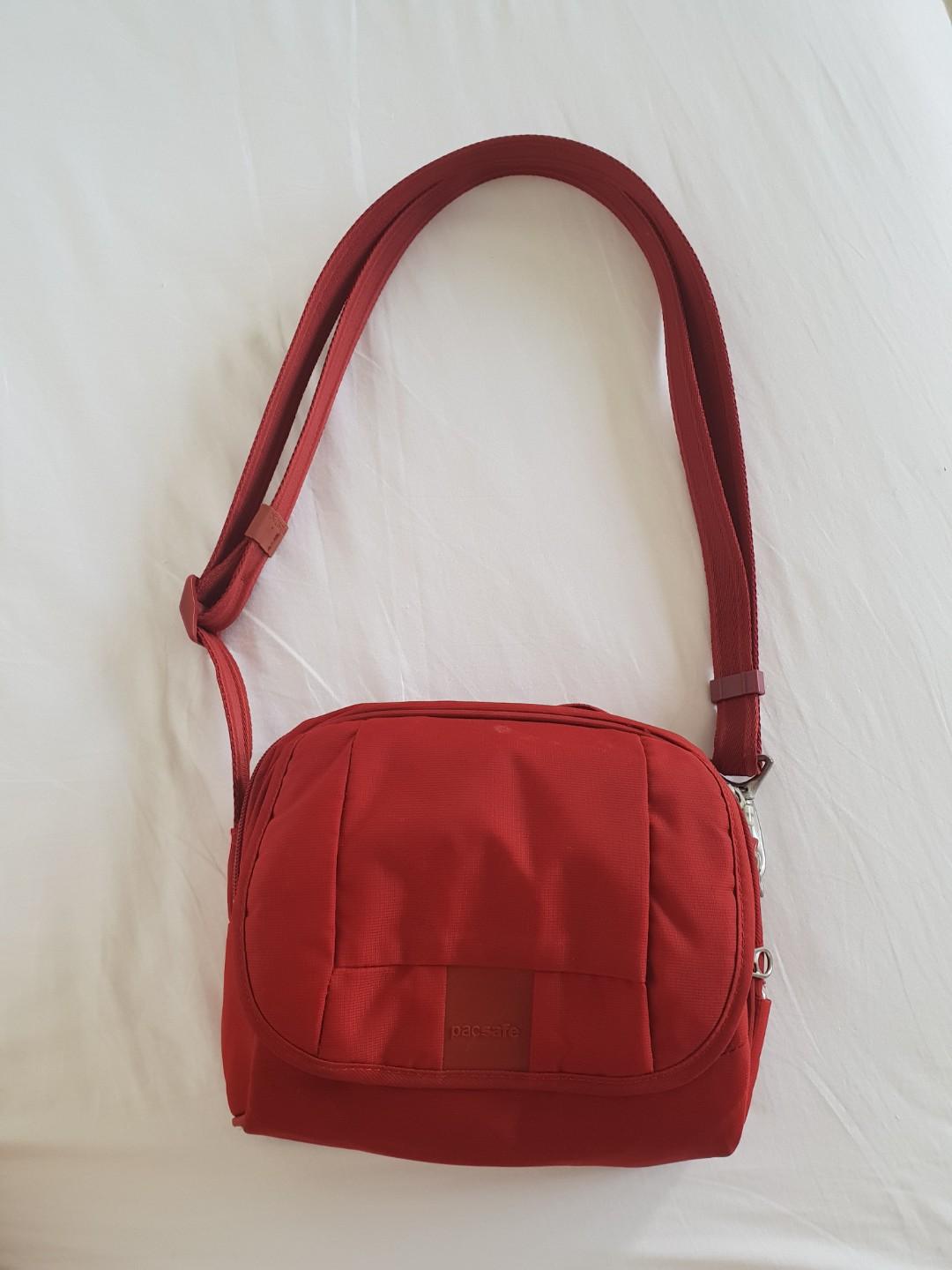 PacSafe metrosafe LS series red sling bag Women s Fashion Bags