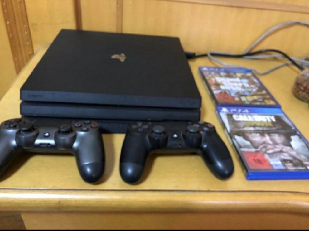 PS4 Pro (Category: PlayStation) located in Pasig City. Submitted by jhunecoousel101902 (Listing ID 1004444800, Image 2). Description: PS4 pro 1T including two controllers (worth of 3500) with 2 games (GTA 5 worth 1500 and COD worth of 2000)..