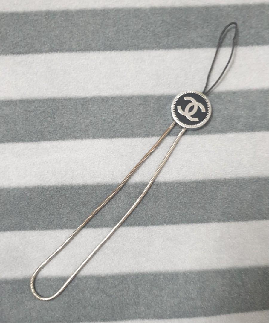 Chanel Phone Strap (Category: Mounts & Holders) located in Pasay City. Submitted by adamclarence (Listing ID 1004737956, Image 1). Description: No box and card.