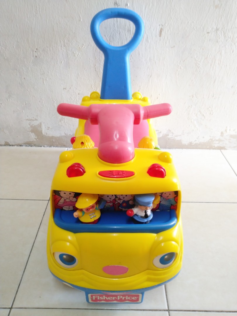 Fisher price ride on bus best sale