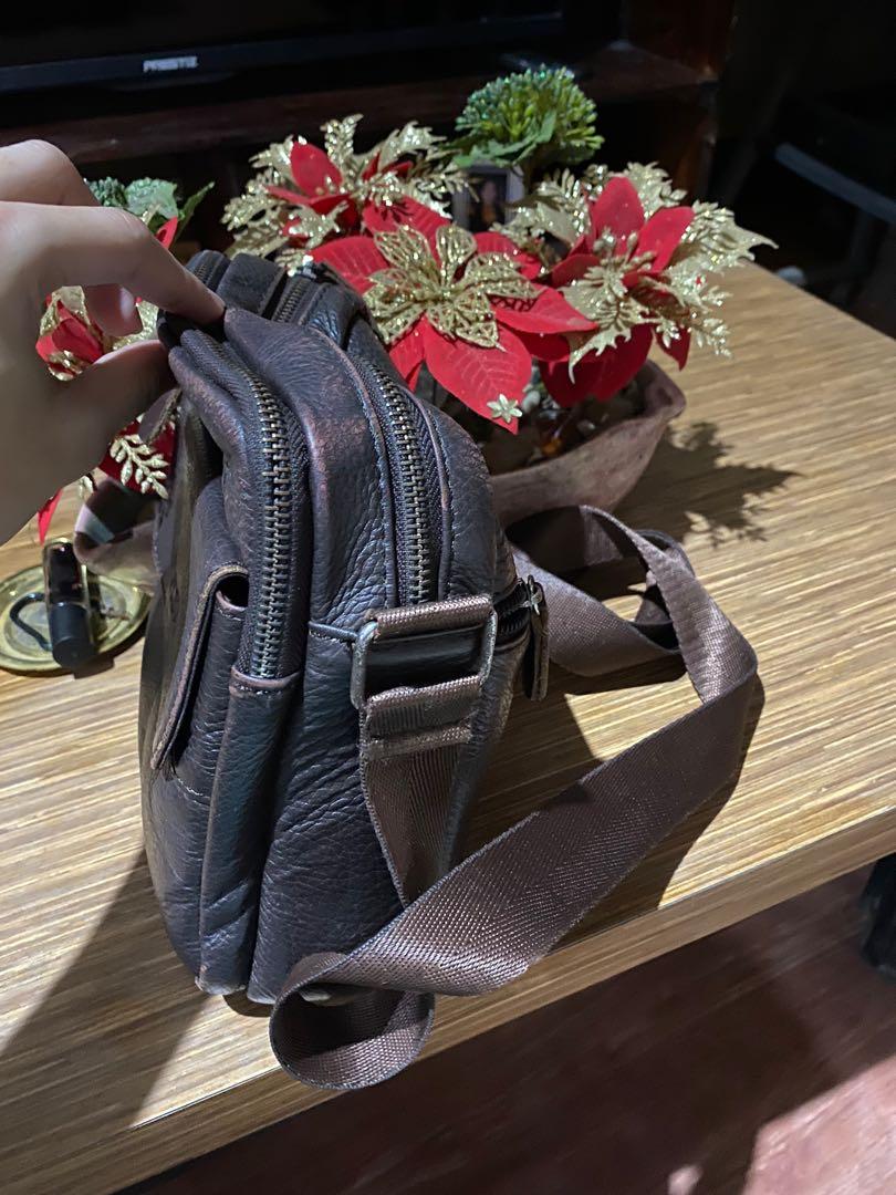 Hickok Small Brown leather sling bag (Category: Sling Bags) located in Quezon City. Submitted by tkmarl (Listing ID 1004744035, Image 2). Description: -True leather bag -still at good condition - 100% leather made.