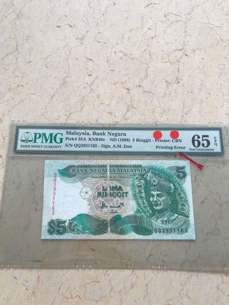 High grade Error note (Category: Currency) located in Singapore. Submitted by ka.ching (Listing ID 1004653178, Image 1). Description: Error note with PMG 65.