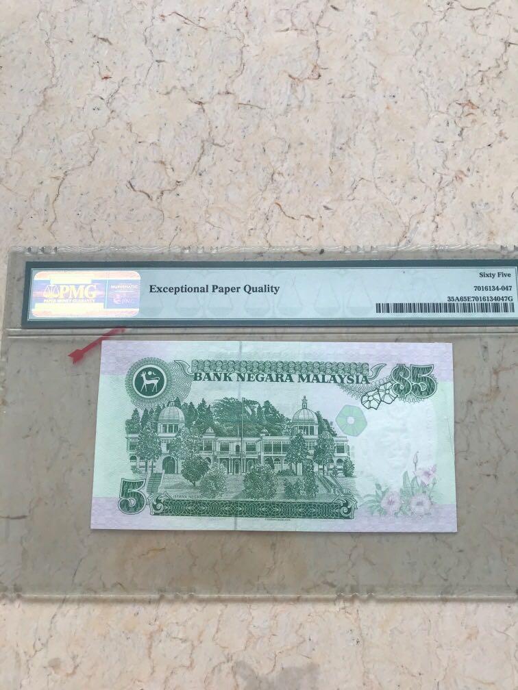 High grade Error note (Category: Currency) located in Singapore. Submitted by ka.ching (Listing ID 1004653178, Image 2). Description: Error note with PMG 65.