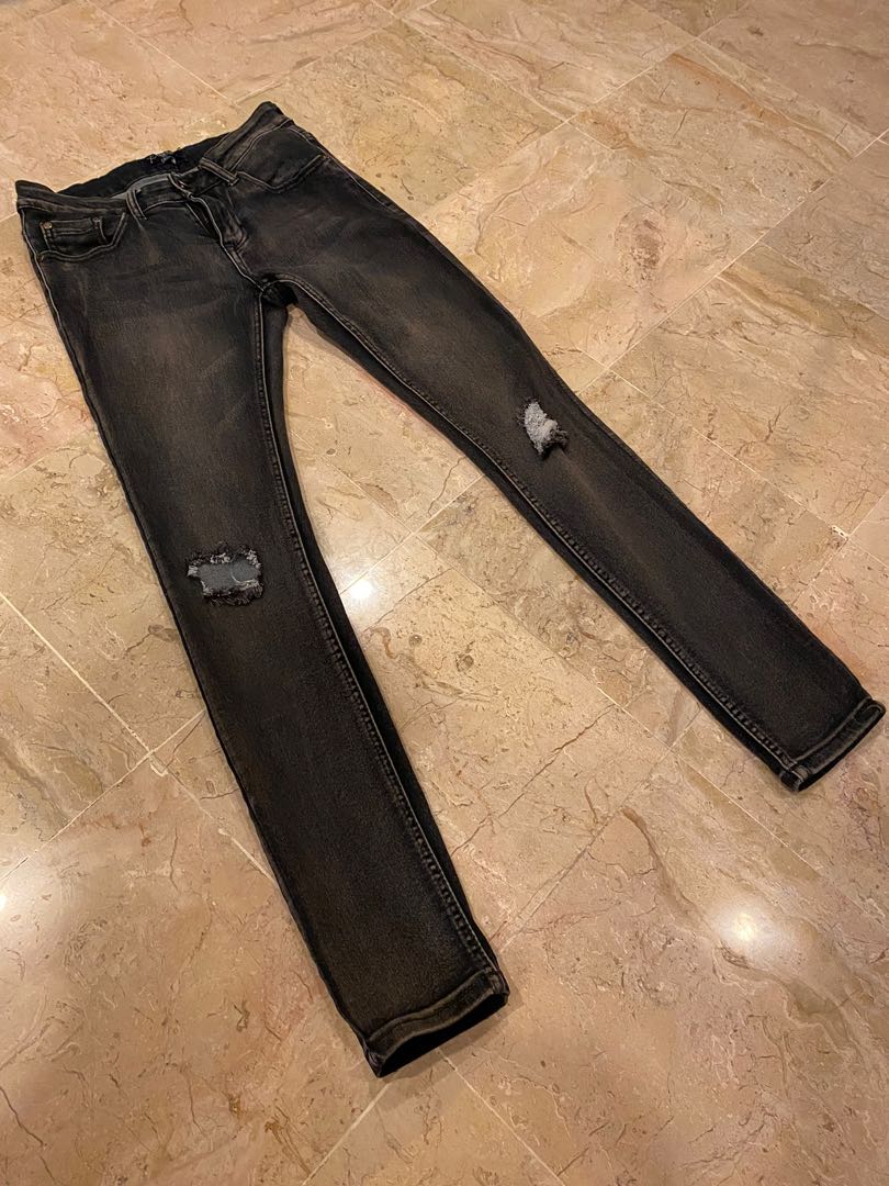 blacked ripped jeans