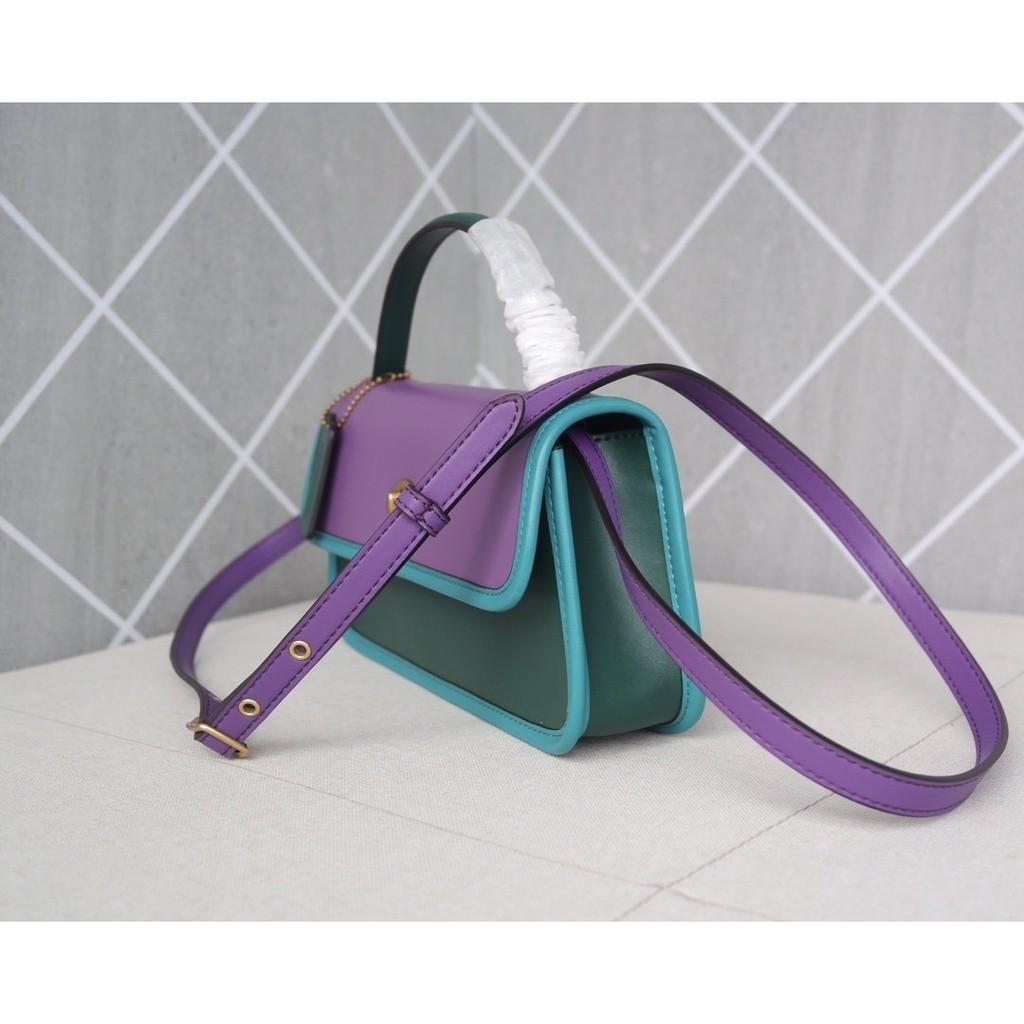 Turnlock clutch in colorblock store