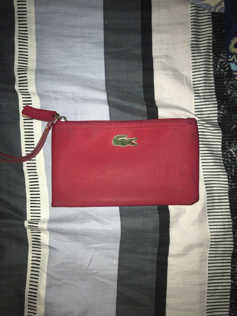Original Lacoste Pouch (Category: Wallets & Card holders) located in Las Pinas. Submitted by ffinds (Listing ID 1005058761, Image 1). Description: original Lacoste Pouch used 7.5/10 condition Needs cleaning Can be shipped .