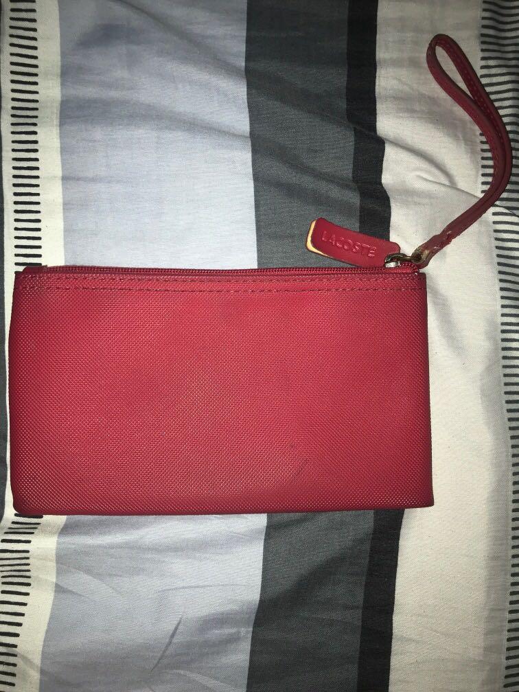 Original Lacoste Pouch (Category: Wallets & Card holders) located in Las Pinas. Submitted by ffinds (Listing ID 1005058761, Image 3). Description: original Lacoste Pouch used 7.5/10 condition Needs cleaning Can be shipped .